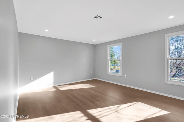 6 Afton Rd, Jackson, NJ 08527 - spare room with plenty of natural light, wood finished floors, baseboards, and recessed lighting