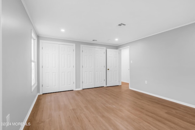 6 Afton Rd, Jackson, NJ 08527 - unfurnished bedroom with two closets, ornamental molding, baseboards, light wood finished floors, and recessed lighting