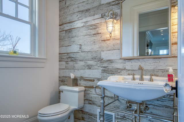 0 Wilson Cir, Rumson, NJ 07760 - half bathroom featuring toilet, wooden walls, and a sink
