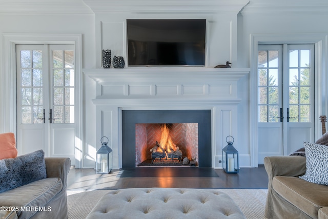 0 Wilson Cir, Rumson, NJ 07760 - detailed view of french doors, a fireplace with flush hearth, ornamental molding, and wood finished floors