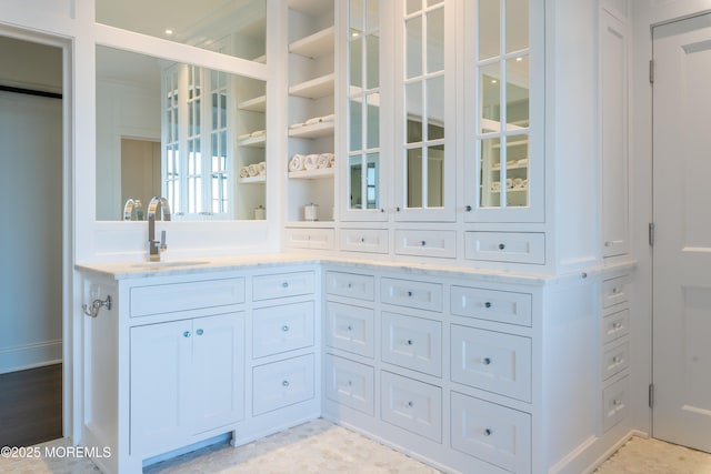 0 Wilson Cir, Rumson, NJ 07760 - kitchen featuring a sink, glass insert cabinets, light stone countertops, and white cabinets