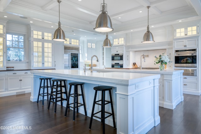 0 Wilson Cir, Rumson, NJ 07760 - kitchen featuring a large island, stainless steel appliances, a warming drawer, a sink, and coffered ceiling