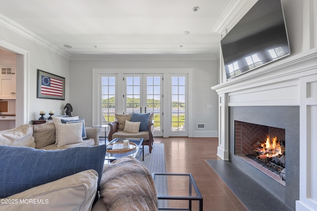 0 Wilson Cir, Rumson, NJ 07760 - living room featuring a fireplace with flush hearth, ornamental molding, wood finished floors, and baseboards