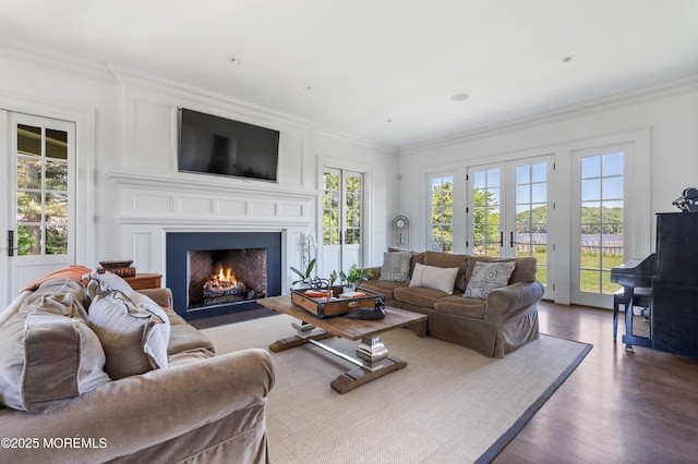 0 Wilson Cir, Rumson, NJ 07760 - living room with healthy amount of natural light, ornamental molding, a fireplace with flush hearth, dark wood-type flooring, and french doors