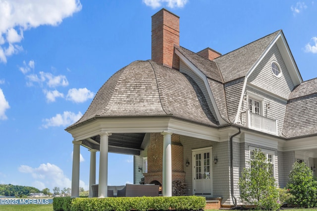 0 Wilson Cir, Rumson, NJ 07760 - view of property exterior featuring a chimney, covered porch, and brick siding