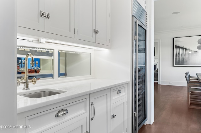 0 Wilson Cir, Rumson, NJ 07760 - bar area with a sink, dark wood-style flooring, fridge, baseboards, and ornamental molding
