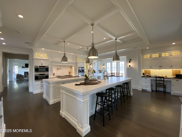 0 Wilson Cir, Rumson, NJ 07760 - kitchen featuring a large island with sink, recessed lighting, white cabinets, coffered ceiling, and tasteful backsplash