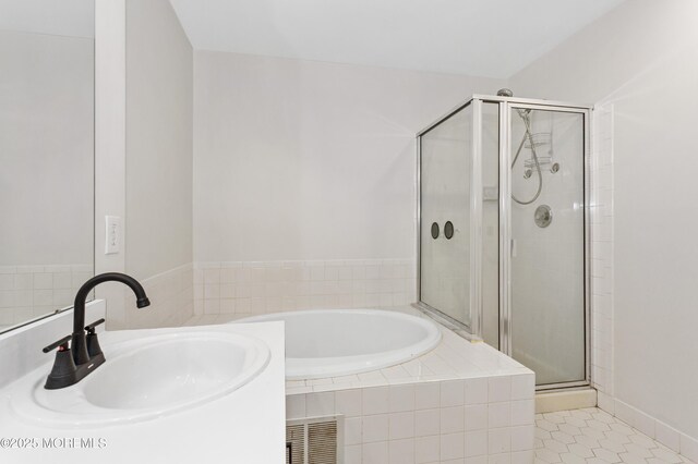 52 Straton Ct Unit 1006, Parlin, NJ 08859 - full bath with a sink, a stall shower, a bath, and tile patterned flooring