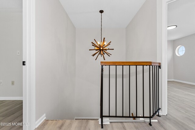 52 Straton Ct Unit 1006, Parlin, NJ 08859 - detailed view of a chandelier, wood finished floors, and baseboards