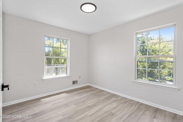 52 Straton Ct Unit 1006, Parlin, NJ 08859 - empty room with light wood-type flooring and baseboards