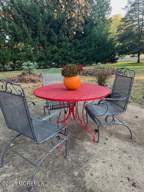 79 Davidson Mill Rd, North Brunswick, NJ 08902 - view of patio / terrace with outdoor dining area