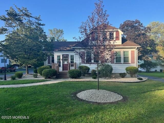 79 Davidson Mill Rd, North Brunswick, NJ 08902 - view of front facade featuring a front yard