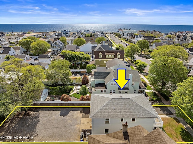 aerial view of residential area with property parcel outlined