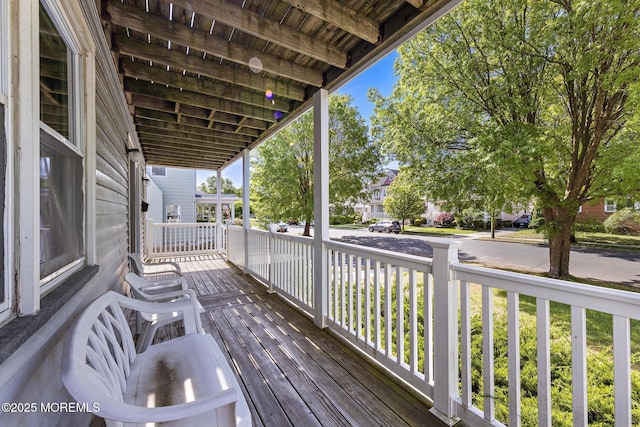 wooden terrace with covered porch
