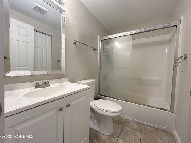 237 Falcon Dr, Little Egg Harbor, NJ 08087 - bathroom featuring toilet, vanity, enclosed tub / shower combo, and tile patterned floors