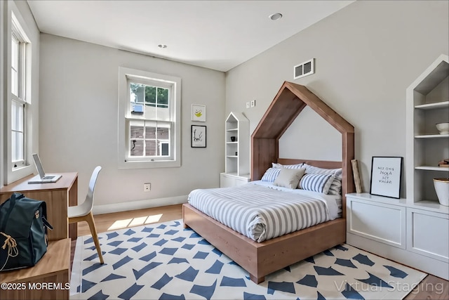 bedroom with baseboards