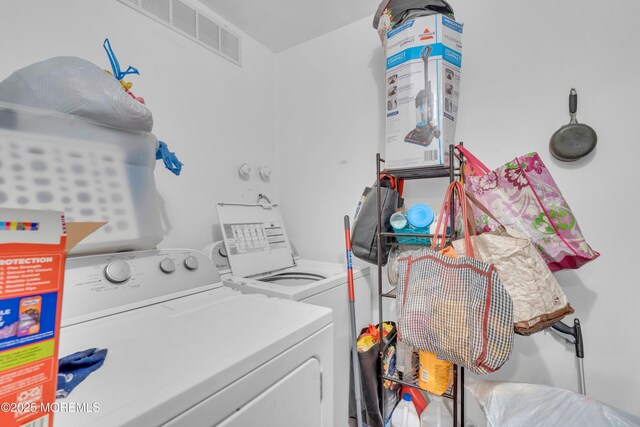 707 Zlotkin Cir Unit 7, Freehold, NJ 07728 - clothes washing area featuring washer and clothes dryer