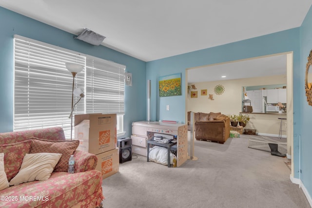 707 Zlotkin Cir Unit 7, Freehold, NJ 07728 - sitting room with carpet floors and baseboards