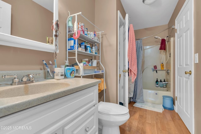 707 Zlotkin Cir Unit 7, Freehold, NJ 07728 - full bath featuring wood finished floors, shower / bathtub combination with curtain, vanity, and toilet