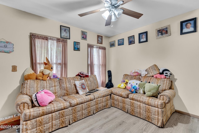 34 Bowne Ave, Freehold, NJ 07728 - living area with a ceiling fan and wood finished floors
