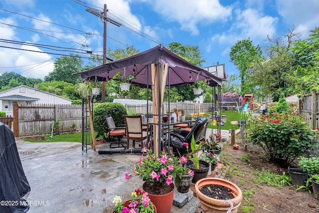 34 Bowne Ave, Freehold, NJ 07728 - view of patio / terrace with a fenced backyard, outdoor dining space, and a playground