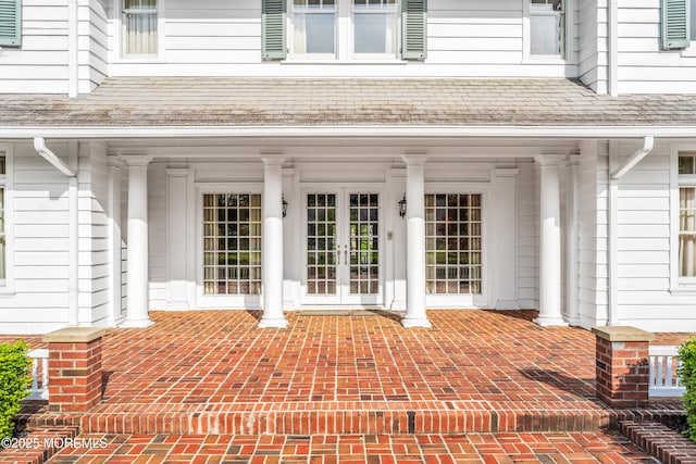 entrance to property featuring french doors