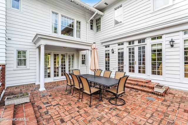 view of patio / terrace featuring french doors and outdoor dining area