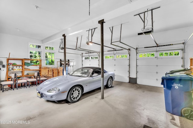 garage featuring a garage door opener