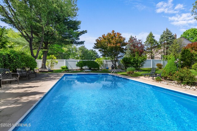 22 Cloverleaf Dr, Marlboro, NJ 07746 - view of pool with a fenced backyard and a patio area