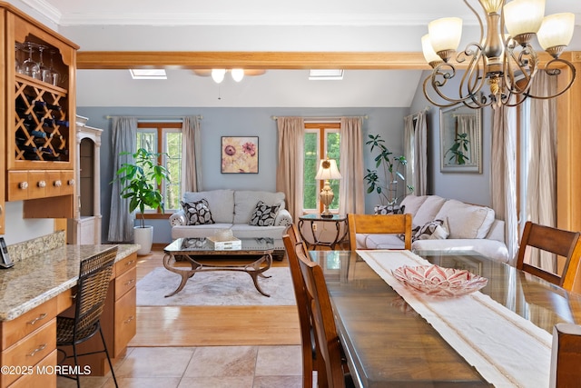 22 Cloverleaf Dr, Marlboro, NJ 07746 - living area with a chandelier, healthy amount of natural light, and vaulted ceiling