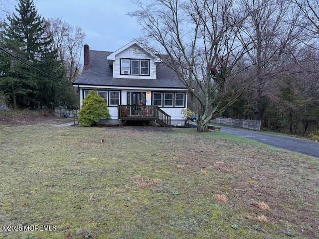1454 Rte 9, Toms River, NJ 08755 - view of front facade featuring a chimney and a front lawn
