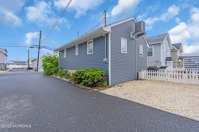 233 Harbor Dr, Lavallette, NJ 08735 - view of property exterior with fence