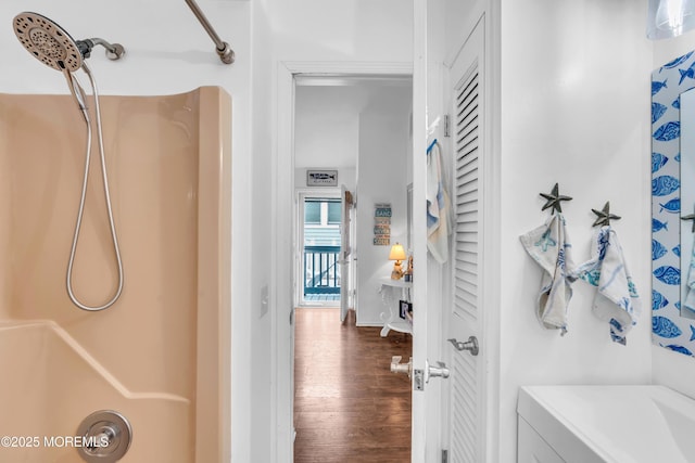 233 Harbor Dr, Lavallette, NJ 08735 - bathroom with a shower, wood finished floors, and baseboards