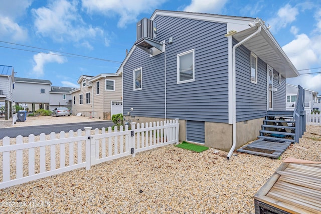 233 Harbor Dr, Lavallette, NJ 08735 - view of property exterior with fence and a residential view
