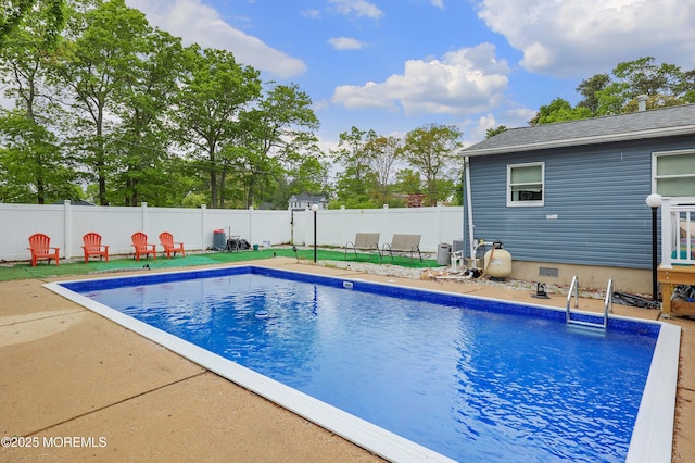 view of swimming pool featuring a fenced backyard