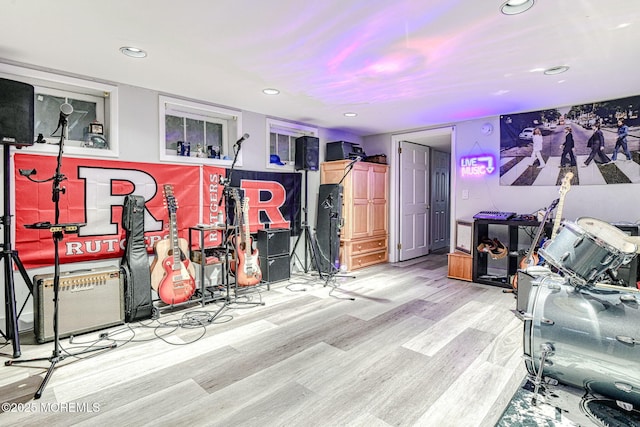 game room featuring wood finished floors and recessed lighting