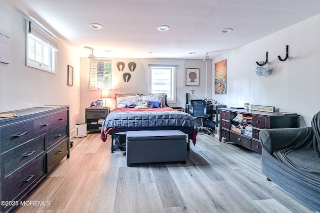 bedroom featuring light wood-style flooring and recessed lighting