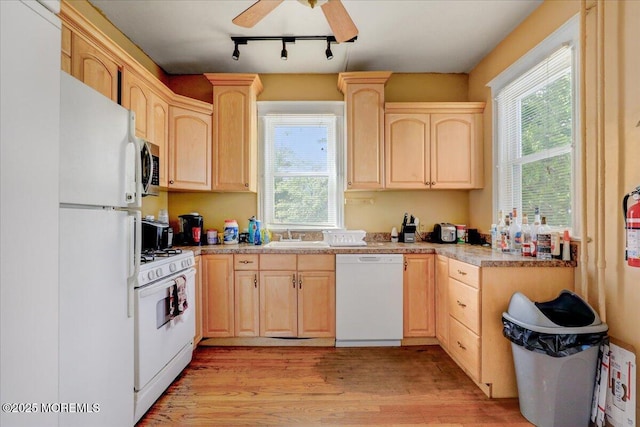 78 Navesink Ave, Highlands, NJ 07732 - kitchen featuring light brown cabinets, white appliances, light wood-style flooring, and a sink