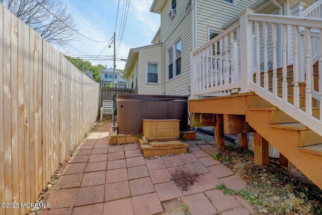 78 Navesink Ave, Highlands, NJ 07732 - view of patio featuring a hot tub, a fenced backyard, a deck, and stairway