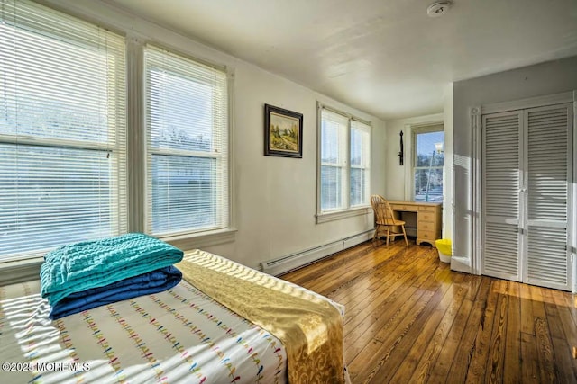 78 Navesink Ave, Highlands, NJ 07732 - bedroom featuring a baseboard heating unit, hardwood / wood-style floors, and an office area