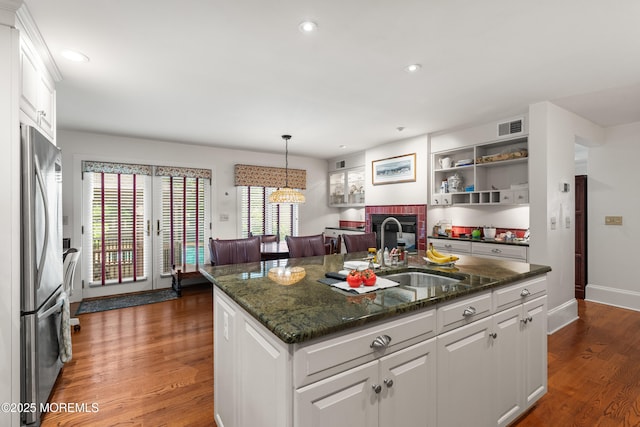 567 Deal Pkwy, Allenhurst, NJ 07711 - kitchen with freestanding refrigerator, a sink, dark wood finished floors, white cabinets, and recessed lighting