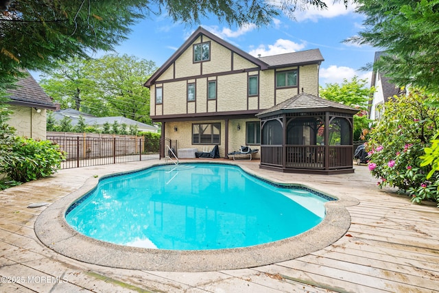 567 Deal Pkwy, Allenhurst, NJ 07711 - view of pool featuring a gazebo, a wooden deck, and fence