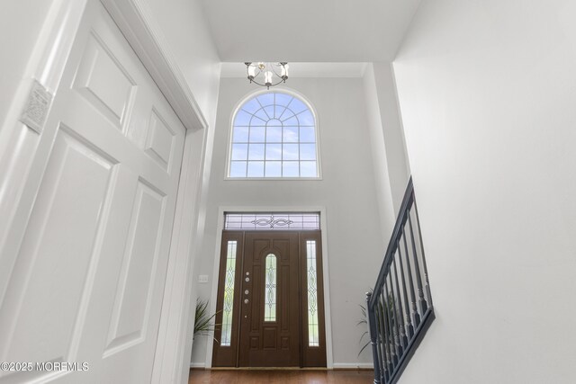29 Jefferson Ct, Jackson, NJ 08527 - foyer entrance with a chandelier, healthy amount of natural light, a high ceiling, and stairway