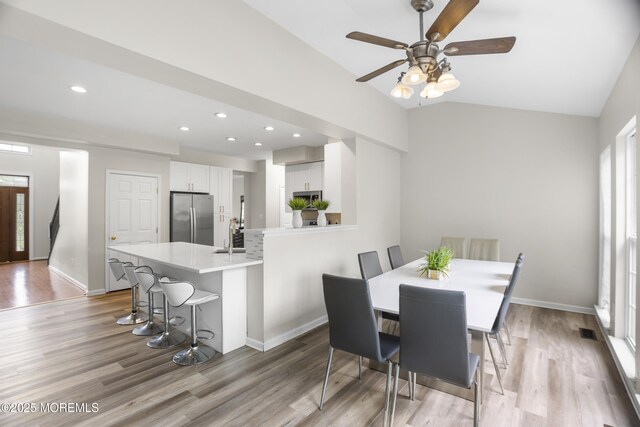 29 Jefferson Ct, Jackson, NJ 08527 - dining space featuring light wood finished floors, recessed lighting, ceiling fan, vaulted ceiling, and baseboards