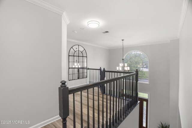 29 Jefferson Ct, Jackson, NJ 08527 - stairs with a chandelier, wood finished floors, ornamental molding, and baseboards