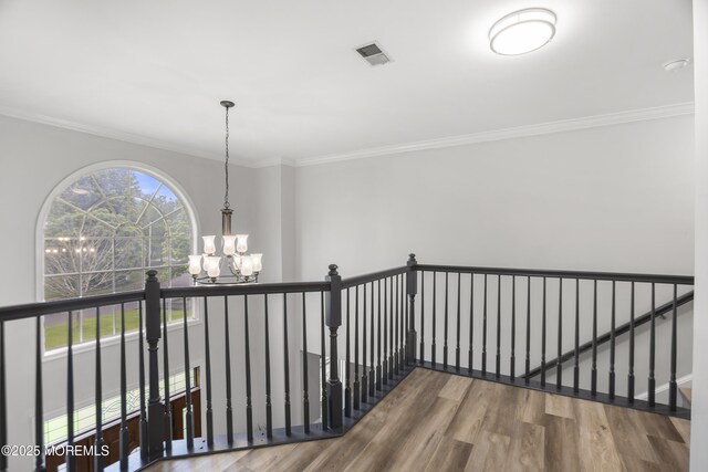 29 Jefferson Ct, Jackson, NJ 08527 - corridor featuring a chandelier, wood finished floors, ornamental molding, and an upstairs landing