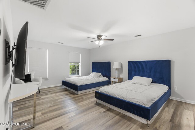 29 Jefferson Ct, Jackson, NJ 08527 - bedroom with wood finished floors, ceiling fan, and baseboards