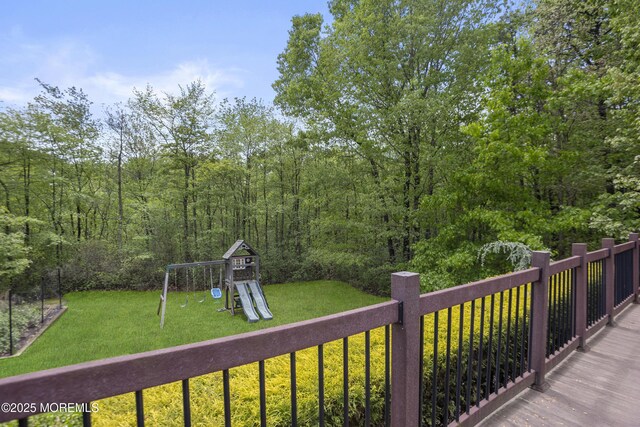 29 Jefferson Ct, Jackson, NJ 08527 - deck featuring a playground, a lawn, and a forest view