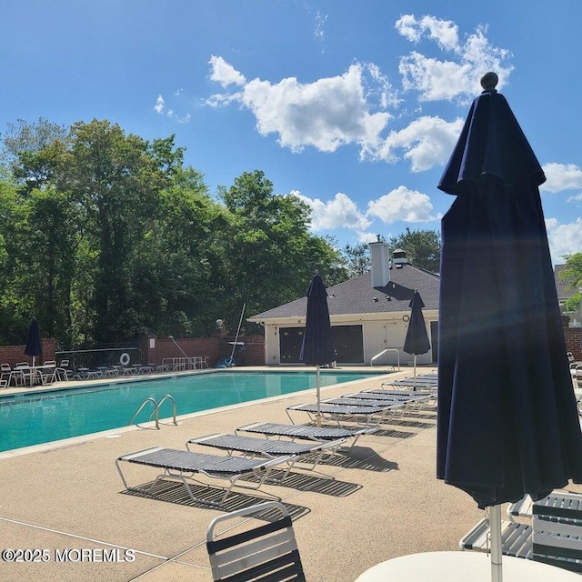 11 Charles Ct, Ocean Twp, NJ 07712 - community pool featuring a patio