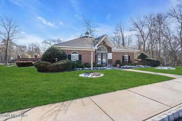 11 Charles Ct, Ocean Twp, NJ 07712 - view of front of property featuring a front lawn, brick siding, french doors, and roof with shingles
